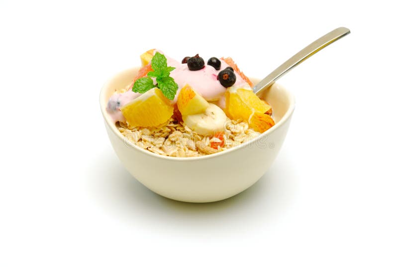 Muesli avec la salade de fruits d'isolement photographie stock libre de droits Muesli avec la salade de fruits d'isolement photographie stock libre de droits