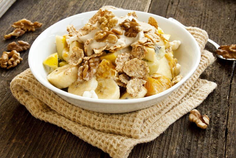 Muesli breakfast with fruits,yogurt and nuts stock photo Muesli breakfast with fruits,yogurt and nuts stock photo