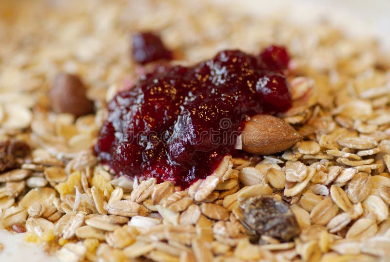 Muesli with raspberry jam