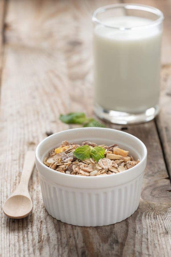 Muesli in White Bowl with Milk. Stock Photo Image of grains, plate
