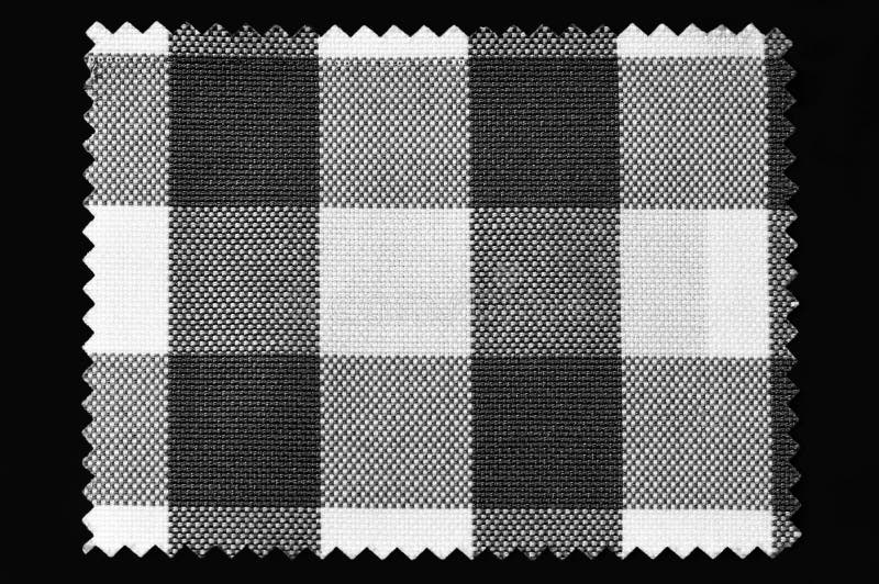 Muestra De Tela a Cuadros Negros Y Blancos Aislada En Fondo Negro