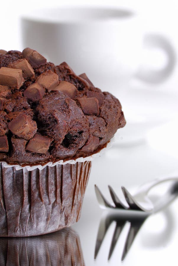 Muffin and a cup of coffee stock image. Image of delicious 6438445