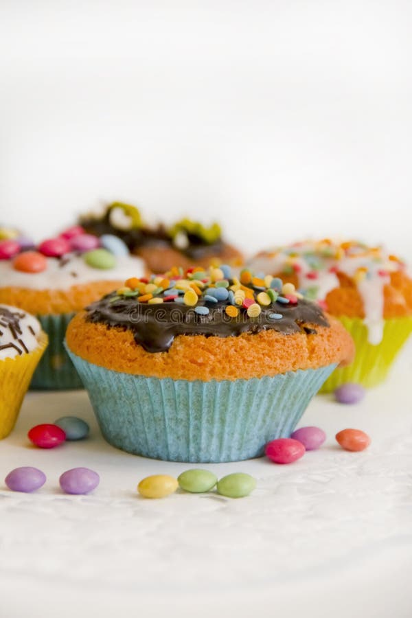 Muffins on cake top detail stock photo. Image of decorated 33907320