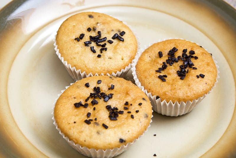 Muffins in cups stock image. Image of pastries, brown 30781957