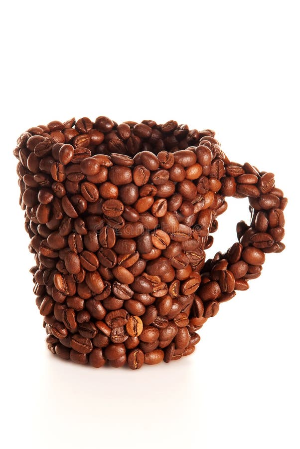 Mug in the coffee beans stock image. Image of closeup 16396893