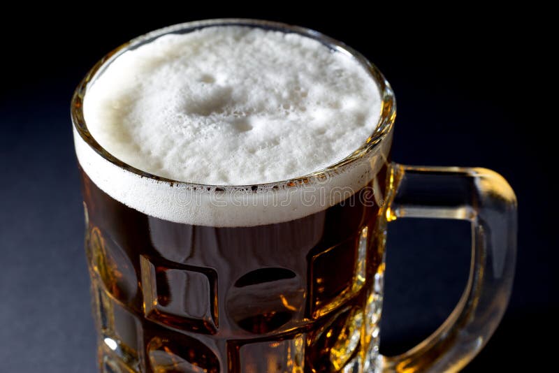 Mug of Fresh Beer with Foam Over Black Background Stock Image Image