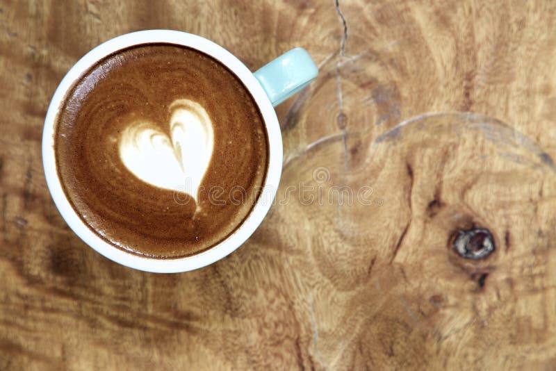 Mug of Latte Art Coffee on Wooden Stock Image - Image of foam, italian