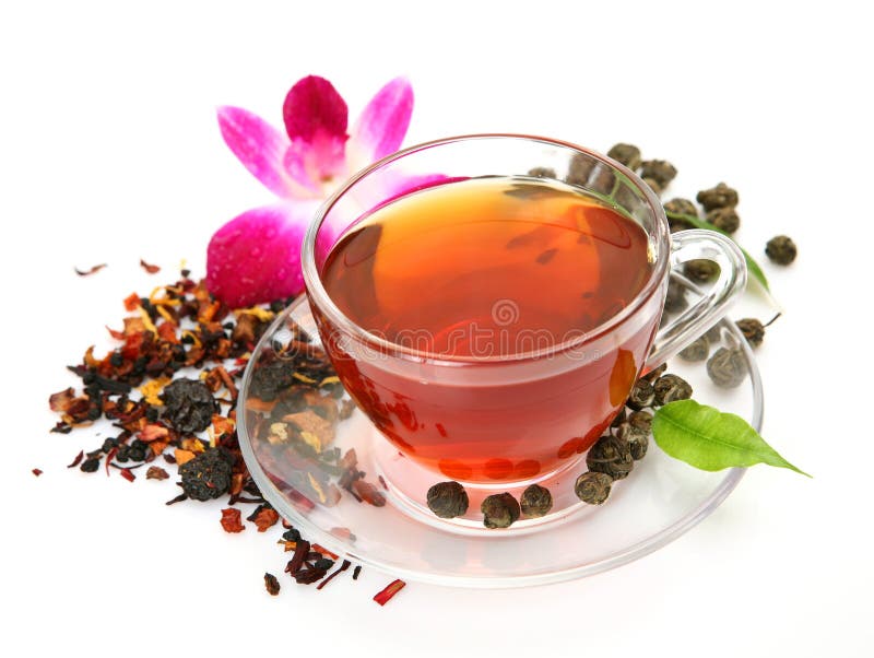 Mug with tea and a flower