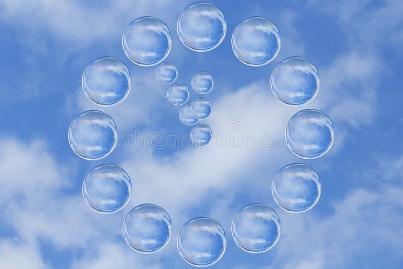 Many soap bubbles form a clock showing five minutes to twelve o`clock against blue sky. Environment or New Year`s Eve concept. Many soap bubbles form a clock showing five minutes to twelve o`clock against blue sky. Environment or New Year`s Eve concept.