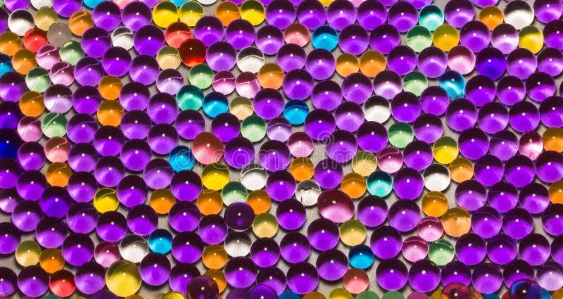 Muitos grânulos coloridos do hydrogel imagem de stock Muitos grânulos coloridos do hydrogel imagem de stock