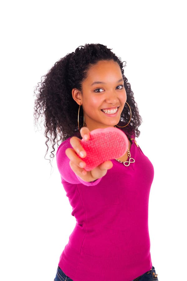 Young african american woman combing hair isolated. Young african american woman combing hair isolated