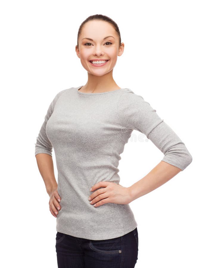 Mujer asiática sonriente sobre el fondo blanco foto de archivo Mujer asiática sonriente sobre el fondo blanco foto de archivo