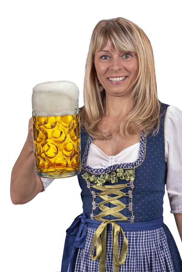 Mujer bastante joven que celebra un vidrio de cerveza en Oktoberfest en Munich fotos de archivo libres de regalías Mujer bastante joven que celebra un vidrio de cerveza en Oktoberfest en Munich fotos de archivo libres de regalías