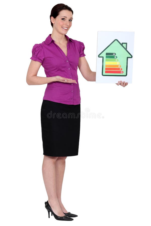 Woman holding energy rating card. Woman holding energy rating card