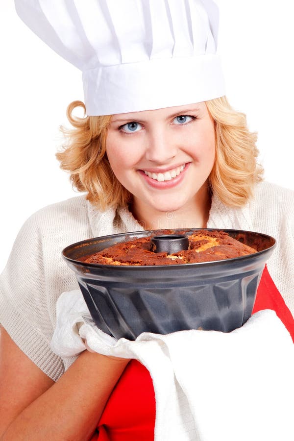 Mujer con la torta del bundt foto de archivo Mujer con la torta del bundt foto de archivo