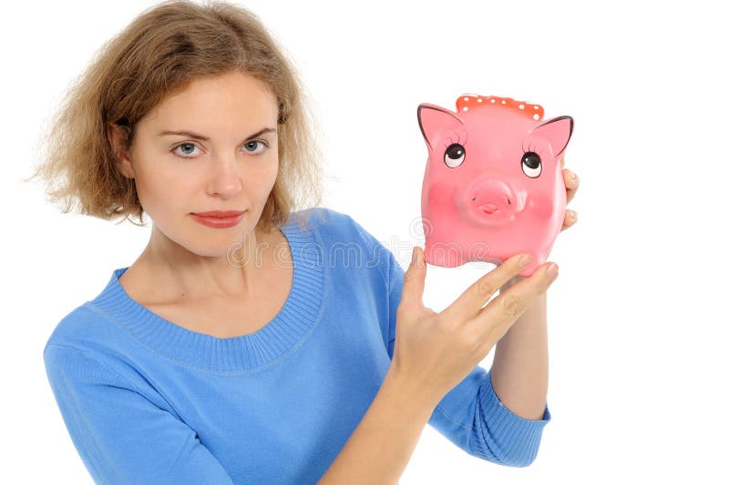 Mujer con un piggybank imágenes de archivo libres de regalías Mujer con un piggybank imágenes de archivo libres de regalías