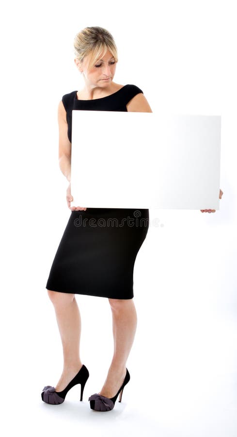 Mujer de negocios con la tarjeta vacía imagen de archivo Mujer de negocios con la tarjeta vacía imagen de archivo