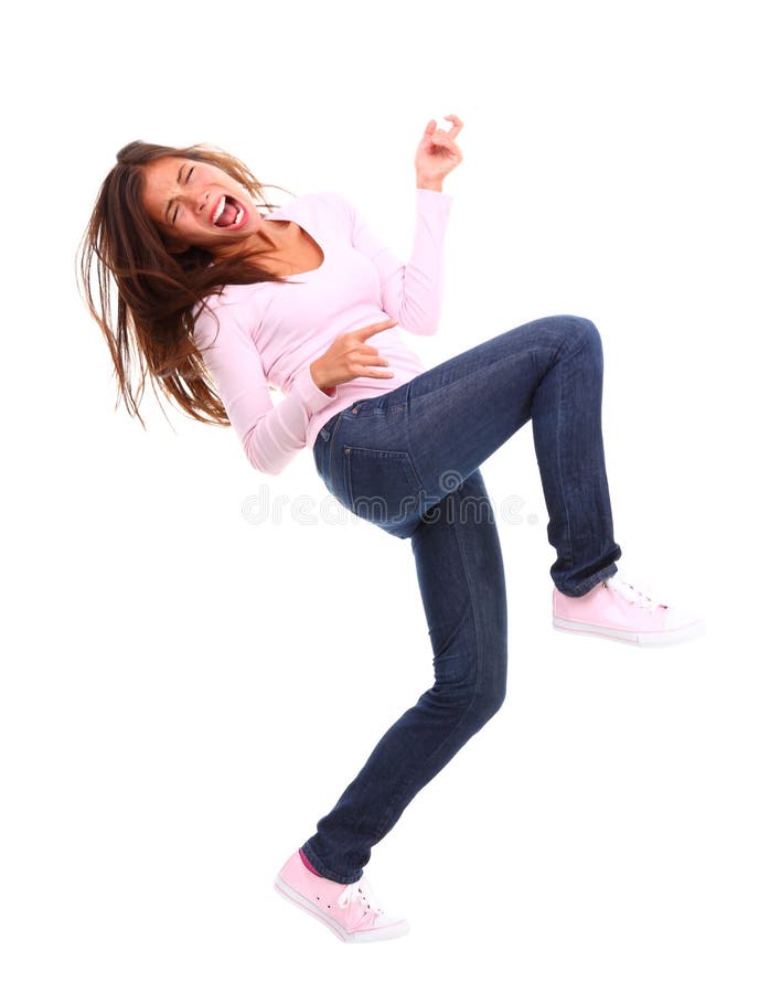 Asian woman intensely playing air guitar. Isolated on white background. Asian woman intensely playing air guitar. Isolated on white background.