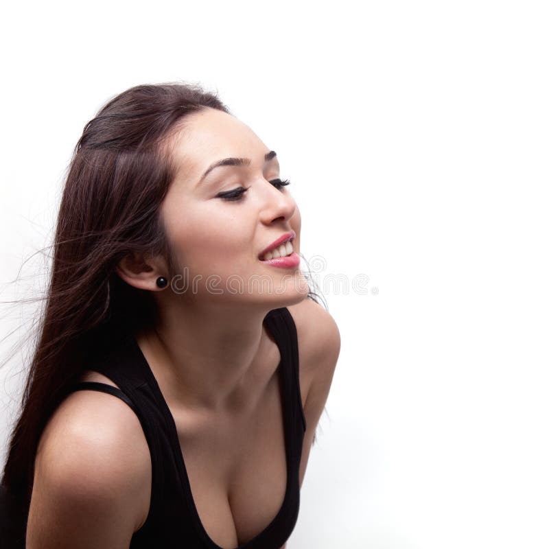 Mujer hermosa atractiva que mira algo fotografía de archivo libre de regalías Mujer hermosa atractiva que mira algo fotografía de archivo libre de regalías