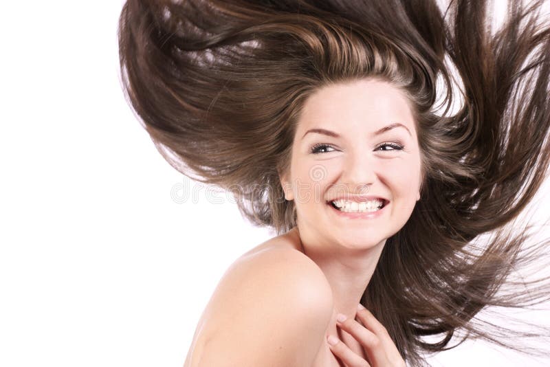 Mujer hermosa con el pelo que sopla foto de archivo libre de regalías Mujer hermosa con el pelo que sopla foto de archivo libre de regalías