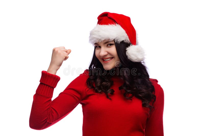 Mujer hermosa de santa de la Navidad que muestra el gesto del poder del éxito Aislado imagen de archivo libre de regalías Mujer hermosa de santa de la Navidad que muestra el gesto del poder del éxito Aislado imagen de archivo libre de regalías