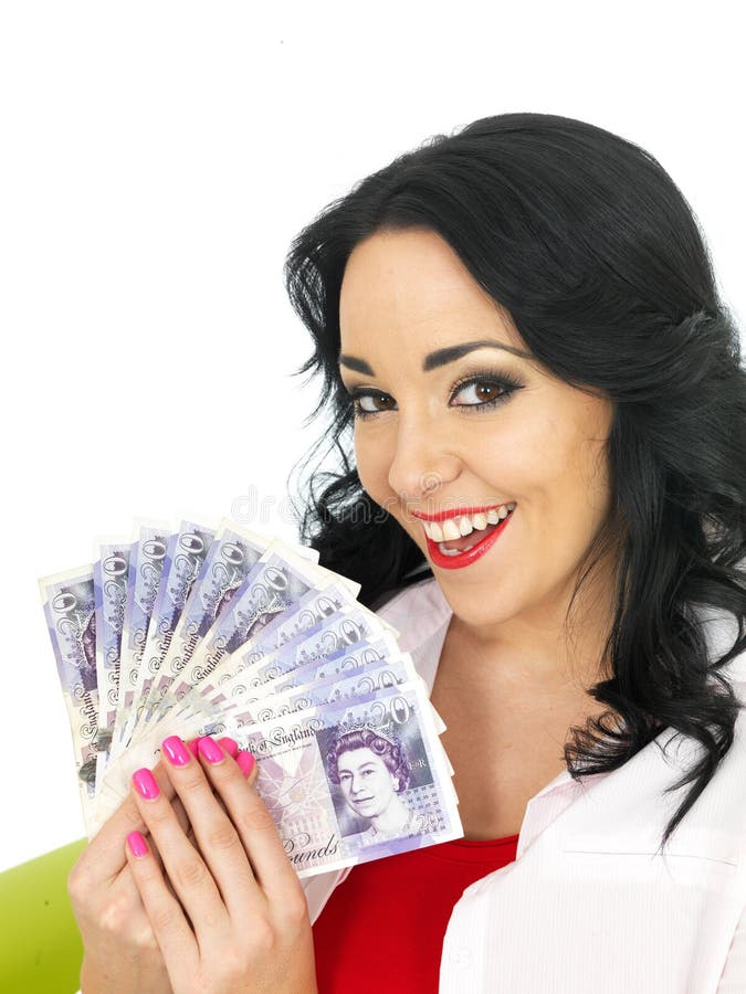 Mujer hispánica joven rica hermosa feliz que sostiene el dinero imágenes de archivo libres de regalías Mujer hispánica joven rica hermosa feliz que sostiene el dinero imágenes de archivo libres de regalías