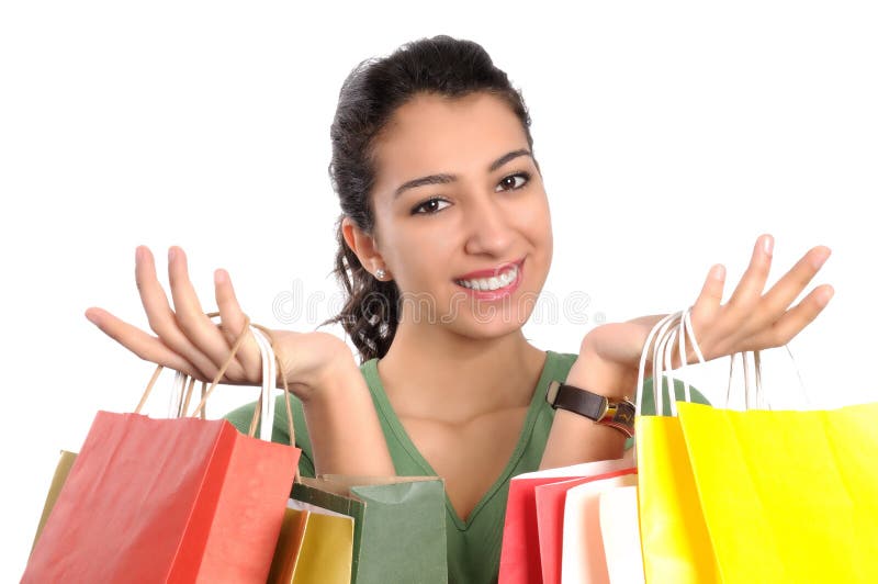 Mujer joven atractiva que hace compras imagen de archivo Mujer joven atractiva que hace compras imagen de archivo