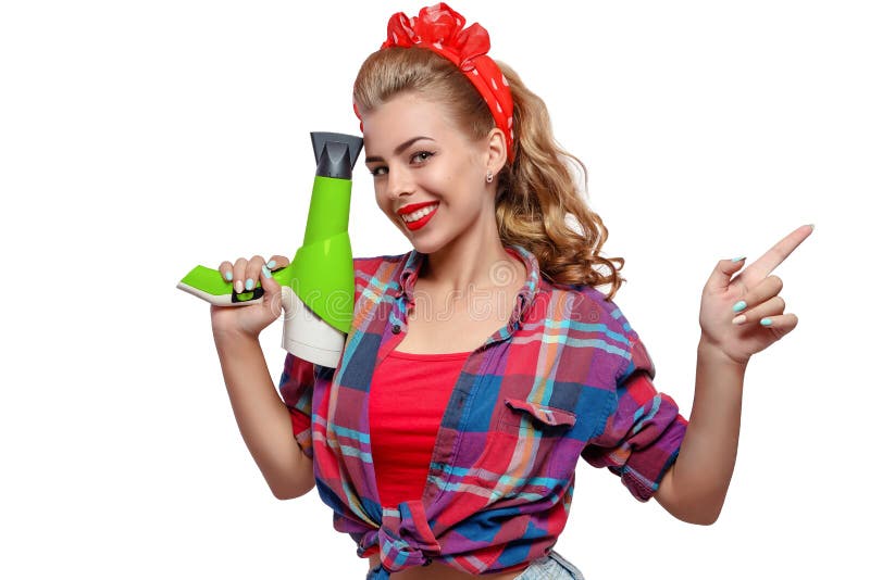 Mujer joven con el hairdryer imagen de archivo libre de regalías Mujer joven con el hairdryer imagen de archivo libre de regalías