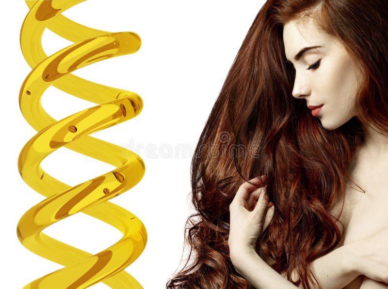 Mujer joven hermosa con el pelo rojo cerca de la hélice con el aceite para la terapia fotos de archivo Mujer joven hermosa con el pelo rojo cerca de la hélice con el aceite para la terapia fotos de archivo