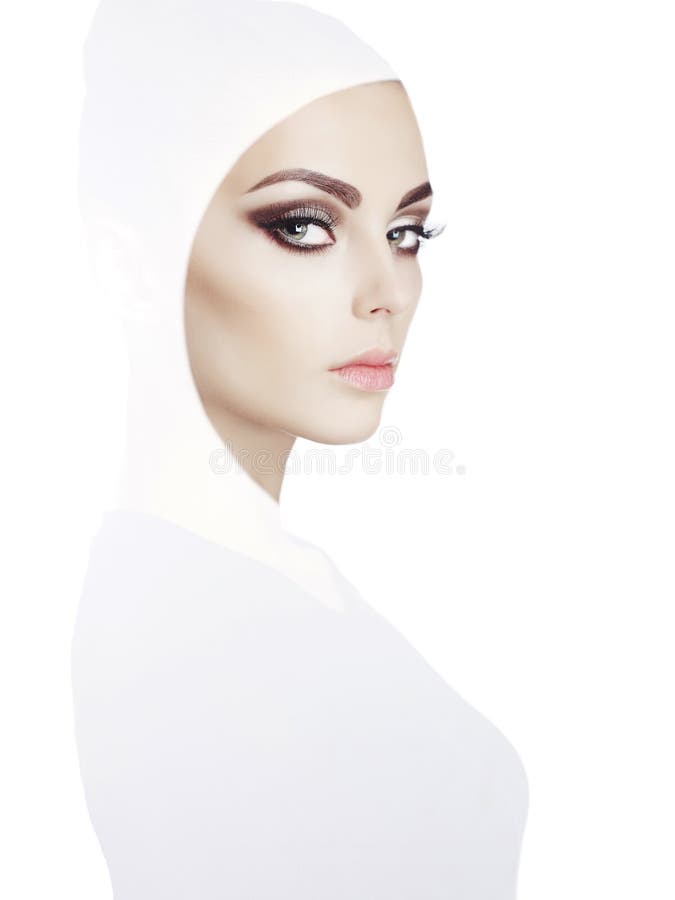 Conceptual art fashion studio photo of beautiful young woman with perfect makeup. Conceptual art fashion studio photo of beautiful young woman with perfect makeup