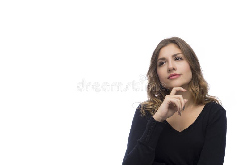 Mujer joven hermosa pensativa, aislada en el fondo blanco imagen de archivo libre de regalías Mujer joven hermosa pensativa, aislada en el fondo blanco imagen de archivo libre de regalías