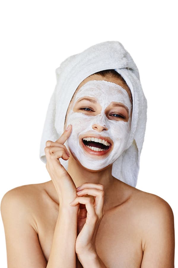 Mujer joven hermosa que aplica la máscara facial en su cara Cuidado y tratamiento de piel, balneario, belleza natural y concepto imagen de archivo libre de regalías Mujer joven hermosa que aplica la máscara facial en su cara Cuidado y tratamiento de piel, balneario, belleza natural y concepto imagen de archivo libre de regalías