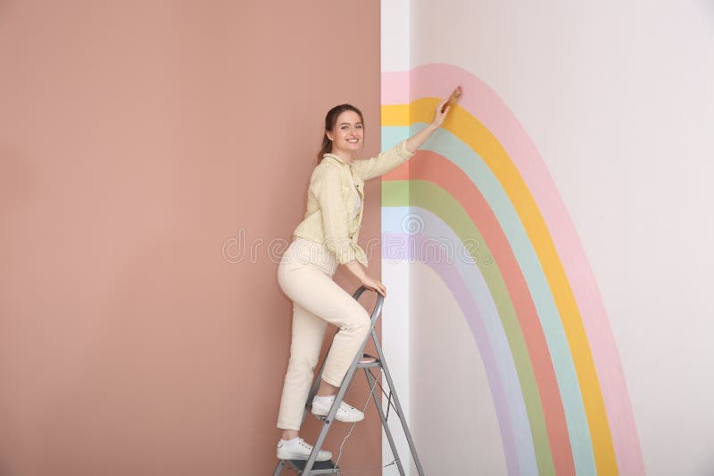 Pintura De Arco Iris En La Ventana Quedarse En Casa Foto De Archivo