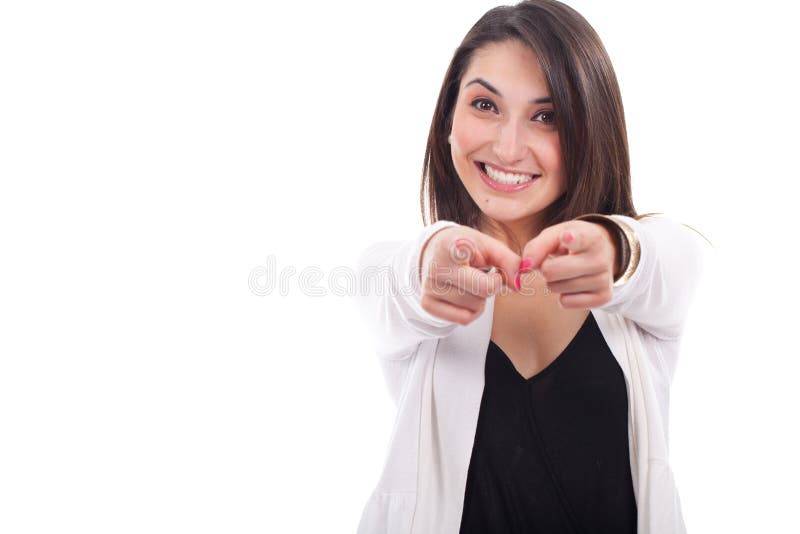 Mujer joven que señala a en alguna parte imagen de archivo