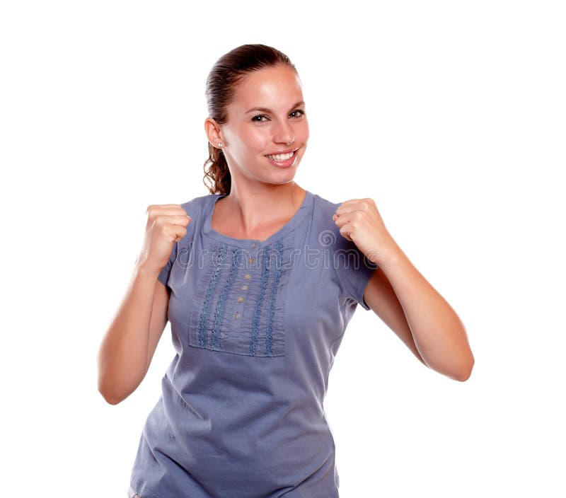 Mujer joven satisfecha con una actitud positiva foto de archivo libre de regalías Mujer joven satisfecha con una actitud positiva foto de archivo libre de regalías