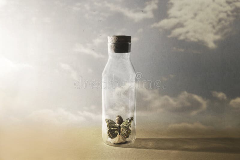 A surreal butterfly woman looks with hope at freedom through a bottle. A surreal butterfly woman looks with hope at freedom through a bottle