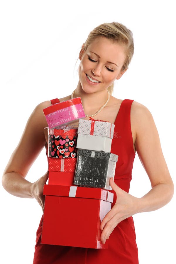 Mujer que sostiene las cajas de regalo fotos de archivo libres de regalías Mujer que sostiene las cajas de regalo fotos de archivo libres de regalías