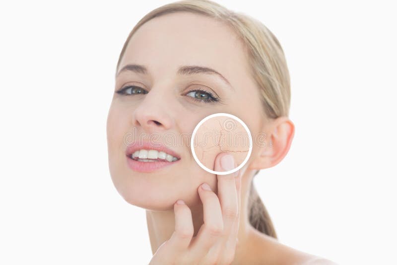 Woman touching her skin with close up of her wrinkles on white background. Woman touching her skin with close up of her wrinkles on white background