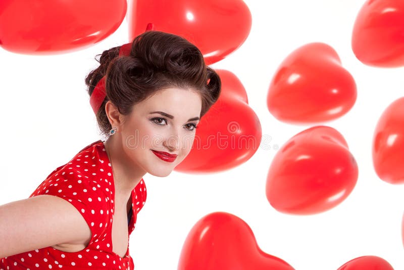 Mujer retra hermosa que celebra a tarjetas del día de San Valentín imagen de archivo libre de regalías Mujer retra hermosa que celebra a tarjetas del día de San Valentín imagen de archivo libre de regalías