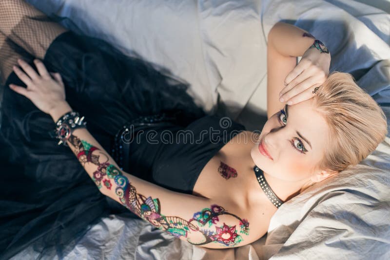Beautiful blond woman with henna tattoo. Beautiful blond woman with henna tattoo