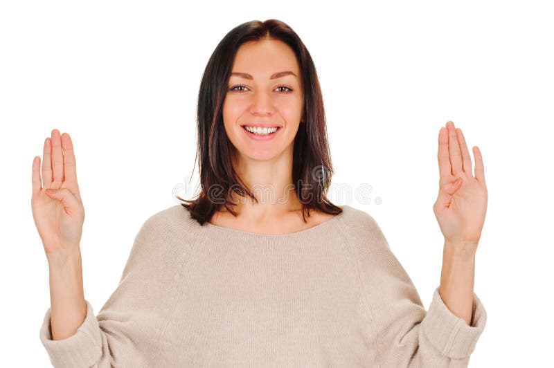 Mujer sonriente que muestra cuatro fingeres imagen de archivo Mujer sonriente que muestra cuatro fingeres imagen de archivo