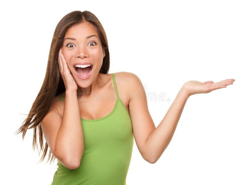 Mujer sorprendida que muestra el producto fotos de archivo Mujer sorprendida que muestra el producto fotos de archivo