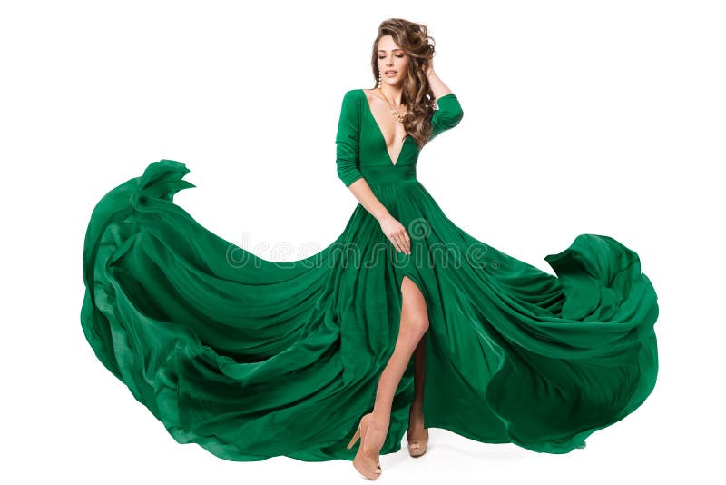 Mujer Vestido De Moda Verde. Modelo En La Noche Larga Slit Vestido Ondeando En El Viento. Chica De Belleza De Moda Bailando En Bla Imagen de archivo - Imagen de encanto, fashionable: Mujer Vestido De Moda Verde. Modelo En La Noche Larga Slit Vestido Ondeando En El Viento. Chica De Belleza De Moda Bailando En Bla Imagen de archivo - Imagen de encanto, fashionable: