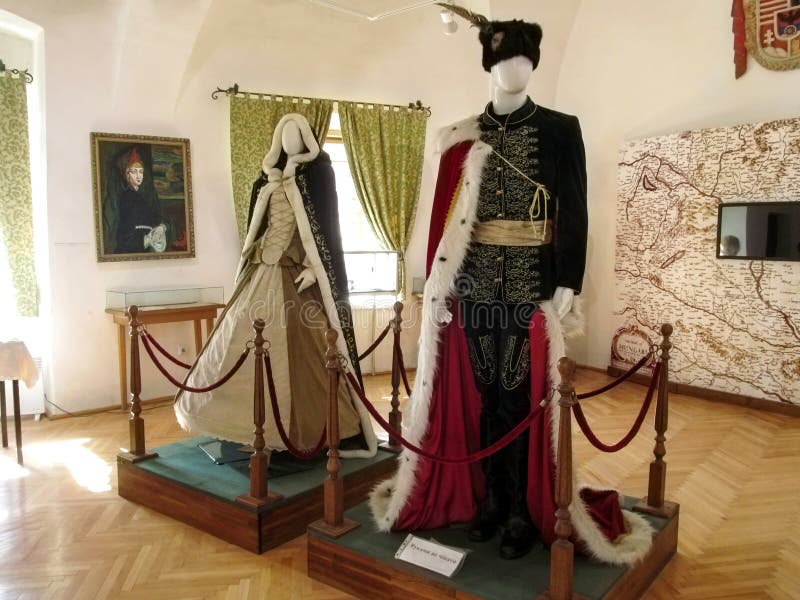 Vintage women’s and men’s costumes of Rakoczi Family Exposition at Palanok Castle Museum royalty free stock image Vintage women’s and men’s costumes of Rakoczi Family Exposition at Palanok Castle Museum royalty free stock image