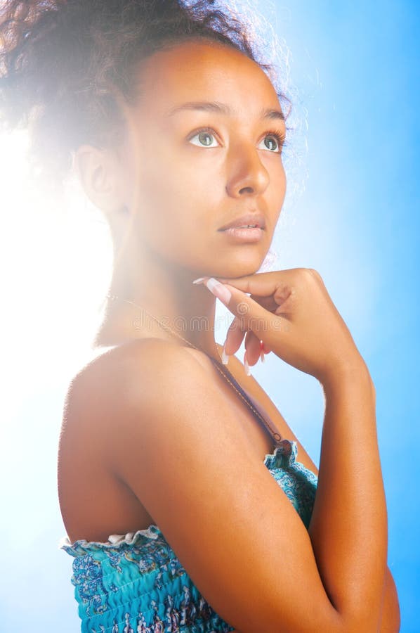 Mulatto Woman on Sky Background Stock Image - Image of beauty, blue