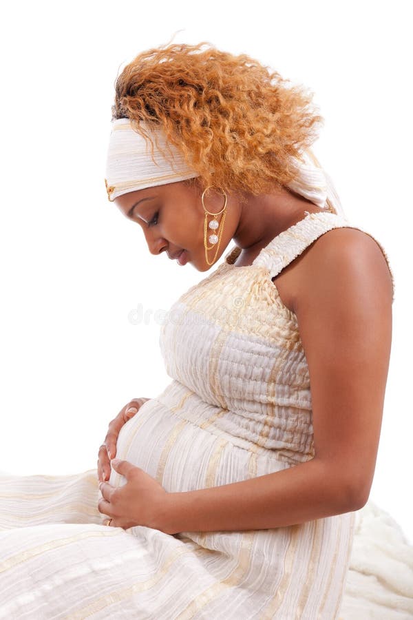 Mulher africana grávida bonita nova imagens de stock royalty free Mulher africana grávida bonita nova imagens de stock royalty free