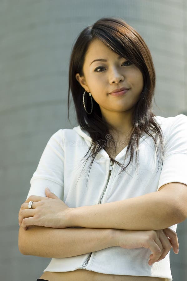 Attractive asian woman outdoor portrait. Attractive asian woman outdoor portrait