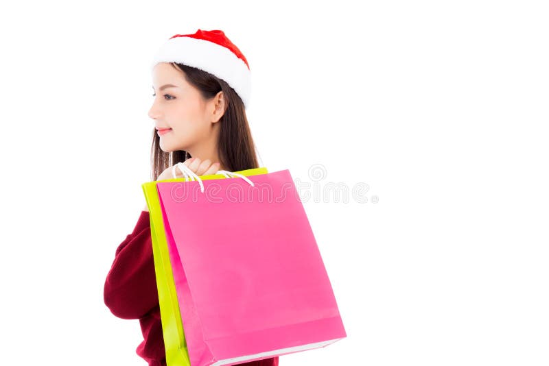 Mulher asiática da forma feliz com o sorriso que guarda o saco de papel da compra imagens de stock royalty free Mulher asiática da forma feliz com o sorriso que guarda o saco de papel da compra imagens de stock royalty free