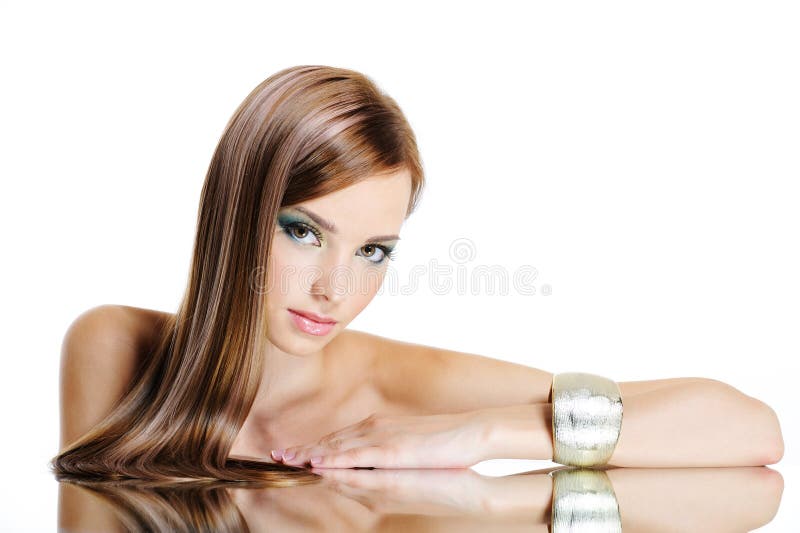 Mulher bonita com cabelo longo reto imagens de stock royalty free Mulher bonita com cabelo longo reto imagens de stock royalty free