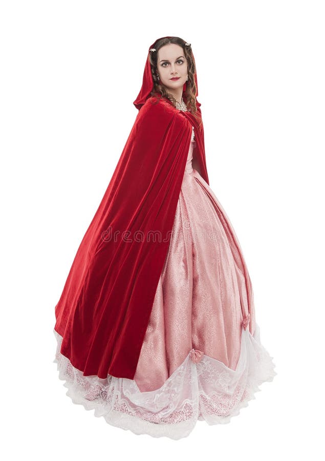 Mulher bonita nova no vestido medieval longo e no casaco vermelho isolados fotografia de stock Mulher bonita nova no vestido medieval longo e no casaco vermelho isolados fotografia de stock